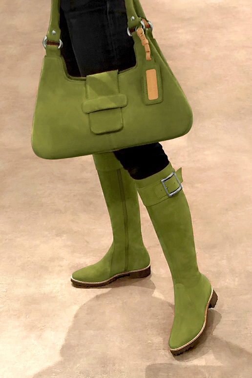 French elegance and refinement for these pistachio green riding knee-high boots, 
                available in many subtle leather and colour combinations. Record your foot and leg measurements.
We will adjust this pretty boot with zip to your measurements in height and width.
Its large, comfortable gum sole will isolate you from the ground.
You can customise the boot with your own materials, colours and heels on the "My Favourites" page.
To style your boots, accessories are available from the boots page. 
                Made to measure. Especially suited to thin or thick calves.
                Matching clutches for parties, ceremonies and weddings.   
                You can customize these knee-high boots to perfectly match your tastes or needs, and have a unique model.  
                Choice of leathers, colours, knots and heels. 
                Wide range of materials and shades carefully chosen.  
                Rich collection of flat, low, mid and high heels.  
                Small and large shoe sizes - Florence KOOIJMAN